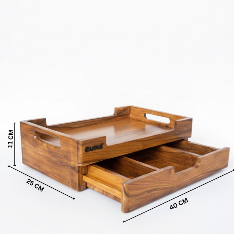 May include: Wooden desk organizer with a pull-out drawer. The organizer is rectangular, with a top tray and a drawer below. The dimensions are 11 cm high, 25 cm wide, and 40 cm long.