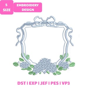 May include: An embroidery design featuring a light blue frame with a bow at the top and floral accents at the bottom. The design includes the text "EMBROIDERY DESIGN" and "5 SIZE". The design is in the format of DST I EXP I JEF I PES I VP3.