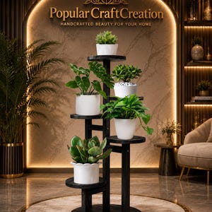 May include: A multi-tiered black wooden plant stand featuring five circular shelves arranged in a staggered vertical design. Each shelf holds a white ceramic pot containing a different green houseplant, creating a tiered display of foliage.