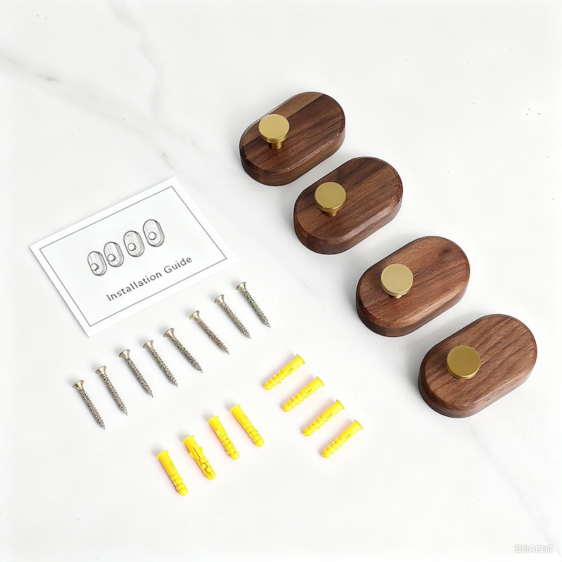 May include: Four wooden wall hooks with brass knobs, screws, and yellow wall plugs are displayed with an installation guide. The hooks are oval-shaped and made of dark wood. The installation guide shows the hook design.