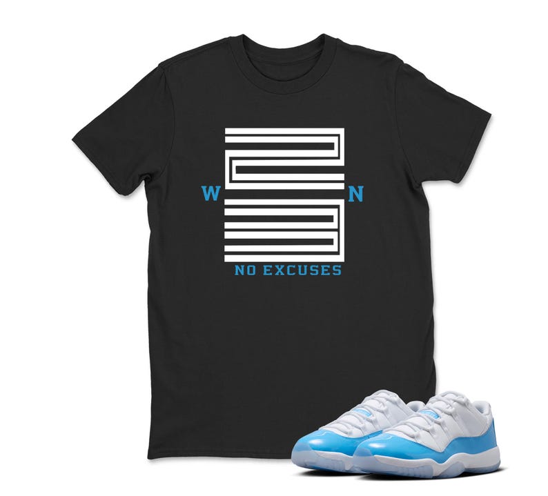 May include: Black t-shirt with a white and blue graphic design that reads "WIN NO EXCUSES". The shirt is paired with a pair of light blue and white trainers.