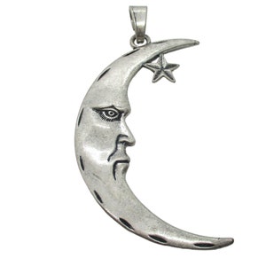 May include: Silver crescent moon pendant with a star at the top and a face on the moon.