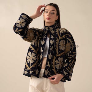 Handmade Velvet Suzani Embroidered Jacket for Women featuring artisan embroidery, boho style, ethnic outerwear, comfortable layering piece, perfect for fall, winter, festivals, travel, and unique gifts.