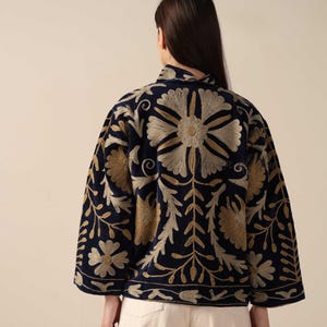 Handmade Velvet Suzani Embroidered Jacket for Women featuring artisan embroidery, boho style, ethnic outerwear, comfortable layering piece, perfect for fall, winter, festivals, travel, and unique gifts.