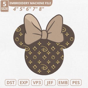 May include: An embroidery machine file featuring a brown Minnie Mouse head with a bow. The head is decorated with a gold pattern and the Disney logo. The file sizes are 4", 5", 6", 7", and 8". The file types are DST, EXP, VP3, JEF, EMB, and PES.