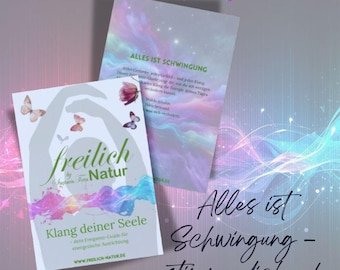 May include: Two books with the title "Frequenz-Guide" and the text "Alles ist Schwingung". The cover of the first book has the word "freilich" and the text "Klang deiner Seele". The background is a gradient of pink, purple, and blue.