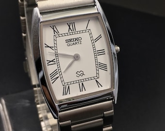 SEIKO QUARTZ シルバーウェーブ　クォーツ 腕時計 8249-700B Rare Seiko Silverwave 8249-700B Classics Round Shape Black Dial