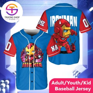 a blue baseball jersey with a cartoon image of Iron Man on the front and back. The jersey is designed for both adults and children, with the text "Adult/Youth/Kid Baseball Jersey" indicating its suitability for different age groups.