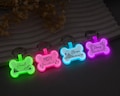 Waterproof Silent Pet ID Tag, Glow in the Dark Silicone Bone Name Tag for Dogs with Custom Engraving and Safety Details product logo