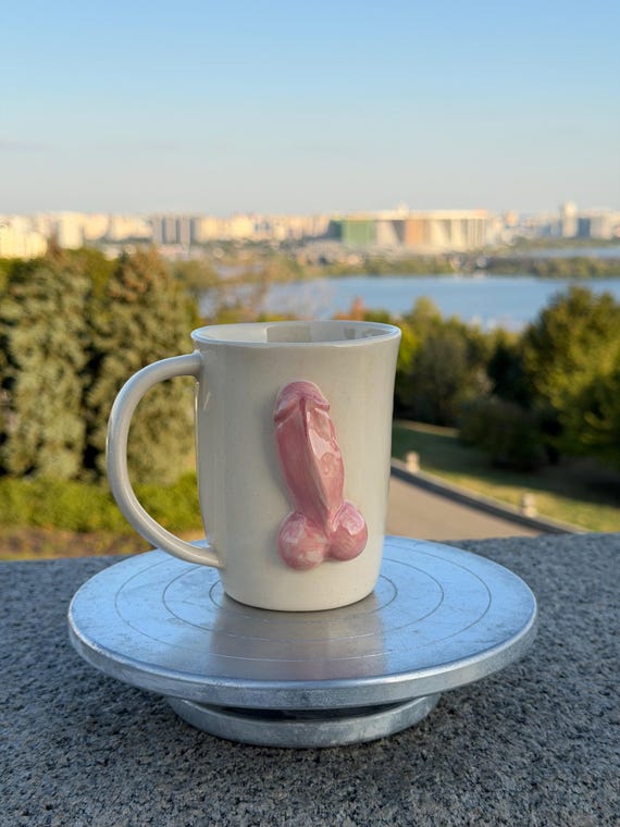 Weird, hand-thrown sculptural pottery that looks like it was designed by a surrealist — the kind of mug that makes guests stop mid-conversation and pick it up.