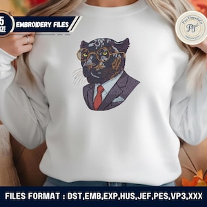 May include: White sweatshirt featuring an embroidered panther wearing glasses, a suit, and a red tie. The design includes the text "EMBROIDERY FILES" and "5 SIZE". The bottom of the image displays "FILES FORMAT : DST, EMB, EXP, HUS, JEF, PES, VP3, XXX".