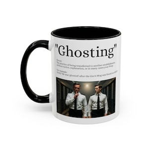 May include: White ceramic mug with a black interior and handle. The mug features the word "Ghosting" in quotation marks, along with a definition and an example sentence. An image of two men is also on the mug.