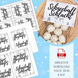 May include: A clear bag filled with white, round treats, labeled "Schneeball Schlacht TO GO." Accompanying are printed labels with the same text and design. A PDF icon with the text "DIREKTER DOWNLOAD NACH DEM KAUF" is also visible.