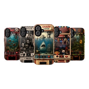 May include: Five rectangular phone cases featuring designs of vintage arcade claw machines. Each case displays a unique theme including a shark, horror movie characters, and a jungle scene, with integrated joystick and prize bin graphics.