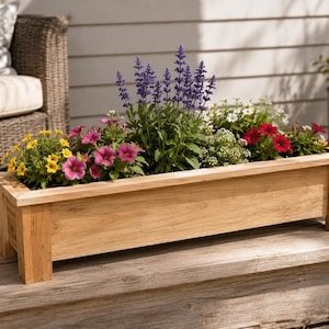 May include: A rectangular light brown wooden planter box filled with a variety of colorful flowers including purple salvia, pink petunias, yellow calibrachoa, and white alyssum. The planter features a simple frame design with four sturdy corner legs.