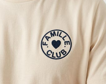 Custom embroidered heart badge tee · Le Club · Mama Family Team · 2 words of your choice · embroidered in France