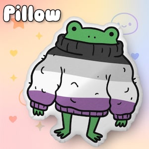 May include: A plush pillow shaped like a cartoon frog wearing a sweater. The frog is green with a black and white sweater with purple cuffs and hem. The word "Pillow" is written in white, bubble letters at the top.
