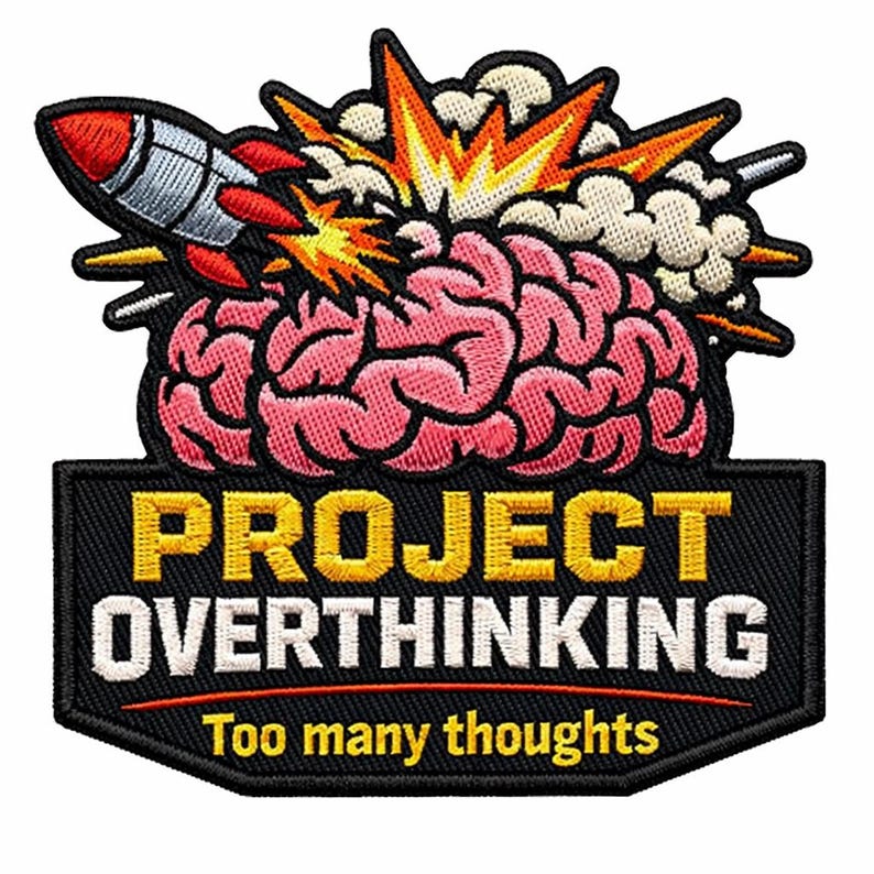 May include: Embroidered patch with a black border. It features a pink brain, a rocket, and an explosion. The text "PROJECT OVERTHINKING" is in yellow and white, with "Too many thoughts" below.