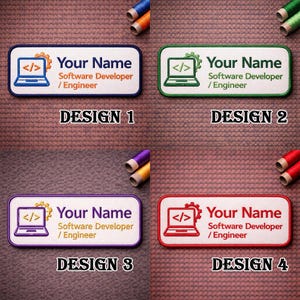 May include: Four embroidered name patches for software developers and engineers. Each patch features a laptop icon, the text "Your Name", and "Software Developer / Engineer". Designs include blue, green, purple, and red borders, with the text "DESIGN 1", "DESIGN 2", "DESIGN 3", and "DESIGN 4".