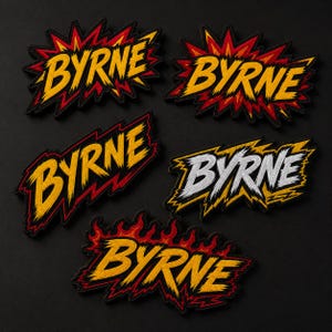 May include: Five embroidered patches with the name "BYRNE" in a bold, comic book style. The patches feature yellow, red, and white lettering with black borders, set against a black background. The designs include burst and flame effects.