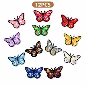 May include: A collection of 12 butterfly patches in various colors, including pink, red, green, purple, blue, yellow, brown, and silver. Each patch has a black outline and is designed with detailed wing patterns.