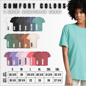 May include: A t-shirt size and colour chart with the words "COMFORT COLOURS" at the top. The chart displays various t-shirt colours, including white, black, and seafoam, with sizes ranging from S to 3XL. Chest width and body length measurements are provided.
