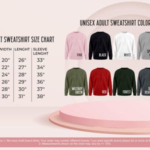 May include: A chart displaying unisex adult sweatshirt size and color options. Sizes range from S to 3X, with width from 20" to 30", length from 26" to 31", and sleeve length from 33" to 38". Color options include pink, black, white, sports grey, sand, military green, red, forest, dark heather, and maroon.