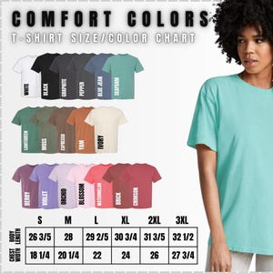 May include: A t-shirt size and color chart with the words "COMFORT COLORS" at the top. The chart displays various t-shirt colors, including white, black, and seafoam, with sizes ranging from S to 3XL. The chest width and body length measurements are also provided.