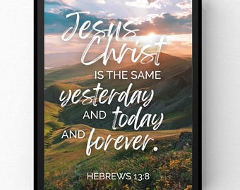 May include: Framed print featuring a scenic landscape with rolling hills and a sunset. White script reads "Jesus Christ is the same yesterday and today and forever." The text "HEBREWS 13:8" is at the bottom.