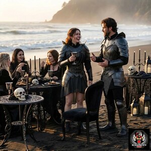 May include: A group of people in medieval armor and gothic attire are gathered on a beach. They are seated at tables with skulls and candles, enjoying a meal. The scene evokes a fantasy or historical theme.