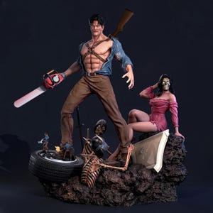 May include: A detailed collectible statue featuring a muscular figure in a blue shirt and brown pants, holding a red chainsaw, with a rifle on their back. Beside them sits a figure in a pink dress with a skull face, surrounded by skeletal remains.