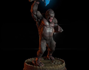 May include: A detailed statue of a gorilla, holding a bone club with a glowing blue energy effect. The gorilla is dark grey with a muscular build, standing on a circular base with a fence. The statue is set against a black background.