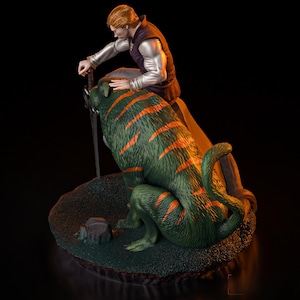 May include: A detailed figurine of a man in a silver and purple outfit, with a sword, sitting on a green feline creature with orange stripes. The base is a small, grassy area with a rock.