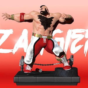 May include: A figurine of Zangief, a muscular character, in a dynamic pose. He wears red and white wrestling attire with gold accents. The figure stands on a black platform with a chain and a can. The name "ZANGIEF" is written in white.