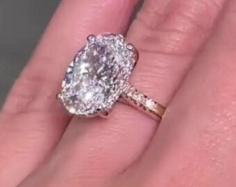 Anello di fidanzamento solitario con moissanite taglio ovale da 3 carati, in oro massiccio 14 carati, con pavé nascosto di diamanti taglio ovale e montatura a cattedrale, ideale come regalo di anniversario o fede nuziale.