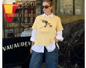Game of Thrones (GOT) quote:  "A dragon is not a slave". George R. R. Martin tribute T-shirt. Ring-spun US cotton. Authentic garment dyed