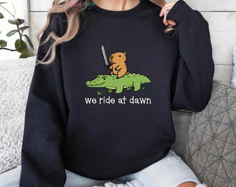 We Ride at Dawn Capybara Sweatshirt: Funny Animal Hoodie