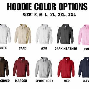 May include: Image showcasing a variety of hoodie color options, including black, white, sand, ash, dark heather, pink, military, forest, dark chocolate, maroon, sport grey, red, and navy. Sizes available: S, M, L, XL, 2XL, and 3XL. Text reads "HOODIE COLOR OPTIONS".