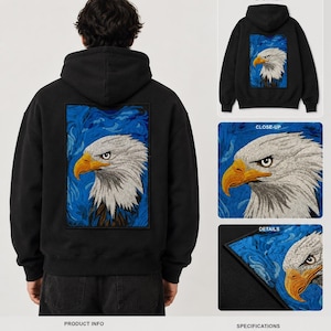 May include: Black hoodie with an embroidered eagle design on the back. The eagle has white feathers, a yellow beak, and is set against a blue background. The design size is 12.74 inches in height and 9.00 inches in width. The hoodie showcases premium embroidery.