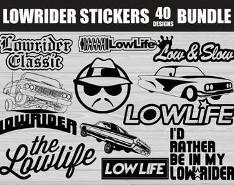 May include: A collection of black and white lowrider stickers with various designs. The stickers feature classic car illustrations, stylized text like "Lowrider Classic" and "Lowlife", and a smiley face with sunglasses and a mustache. The text "Lowrider Stickers 40 Bundle Designs" is at the top.