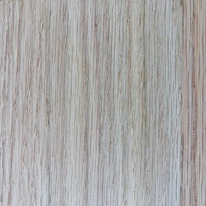 May include: Close-up of a light brown wood grain surface with a vertical pattern.