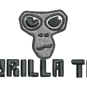 Könnte beinhalten: Gestickter Aufnäher mit einem stilisierten Gorillagesicht über den Worten "GORILLA TAG" in einer kantigen Schriftart. Das Design verwendet schwarzen Faden auf weißem Hintergrund und erzeugt ein detailliertes, kontrastreiches Bild.