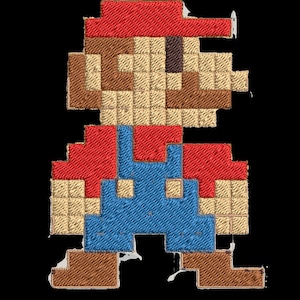 May include: A pixelated embroidered image of a video game character. The character is wearing a red hat, brown overalls, and brown shoes. The character is standing with their arms at their sides.