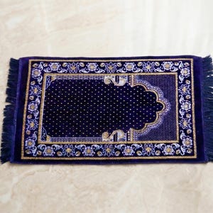 turkish prayer rug seccade, islamic prayer rug, velvet feel prayer mat, floral border design, handwoven look and texture, soft comfortable salah mat, muslim gift idea, ramadan gift, eid gift, prayer corner rug, prayer room decor, islamic home decor, portable lightweight travel mat, sajjadah prayer carpet, traditional turkish seccade, ethnic pattern rug, premium woven mat, comfortable kneeling rug, ornamental fringe, traditional tassels, gift for her, gift for him, prayer rug seccade,