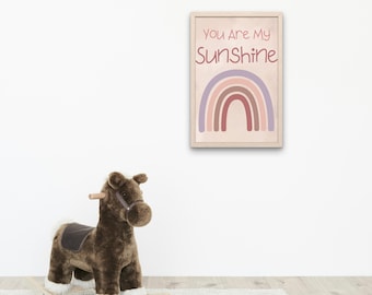 Arte de pared con temática de sol para guardería