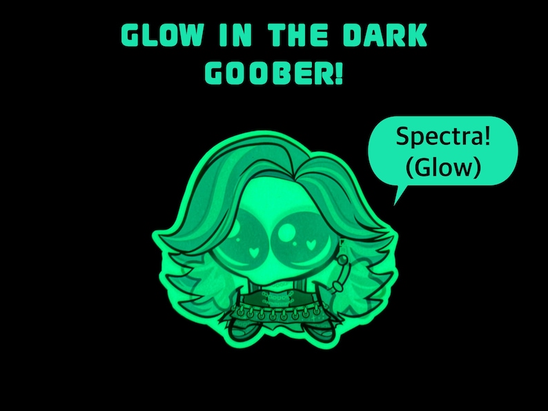 Op de afbeelding: Een glow-in-the-dark sticker met een gestileerd personage met grote ogen en golvend haar. De tekst GLOW IN THE DARK GOOBER! staat erboven en een tekstballon aan de rechterkant bevat de tekst Spectra! (Glow). Het ontwerp is felgroen.