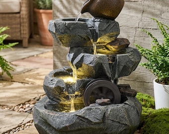 Fuente de roca en cascada de 3 niveles con jarra vertiente e iluminación LED, ideal para interiores y exteriores.