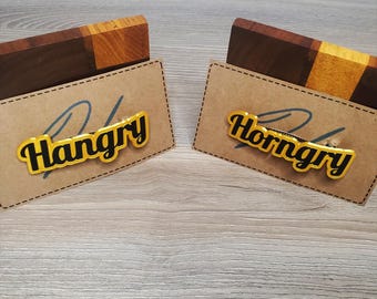 Pinza para el cabello francesa dorada y negra Hangry o Horngry