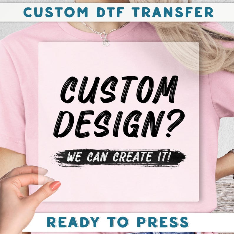 The image is a promotional poster for a custom DTF (Digital Transfer Factory) service, featuring a person wearing a pink shirt and holding a white sign with the text "CUSTOM DESIGN? WE CAN CREATE IT!"