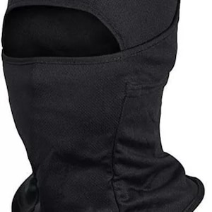 May include: A black balaclava with an eye opening and neck coverage. The balaclava is made of a breathable, textured material. This headwear is designed for protection from the elements.